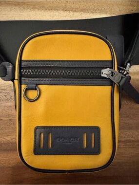 Coach Mustard Yellow and Black Leather Crossbody Pouch